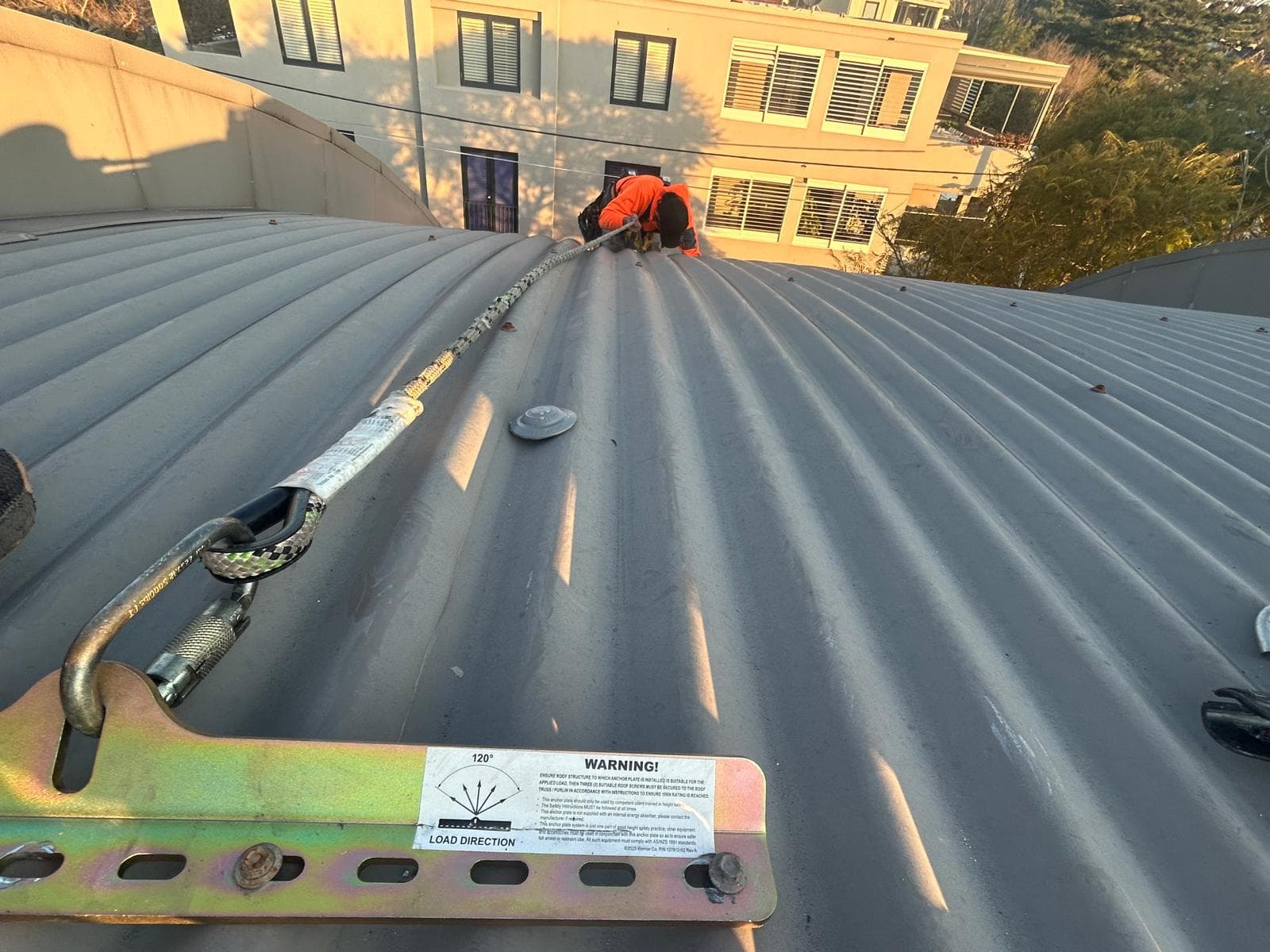 Roof access and fall-arrest setup on light corrugated roof sheeting
