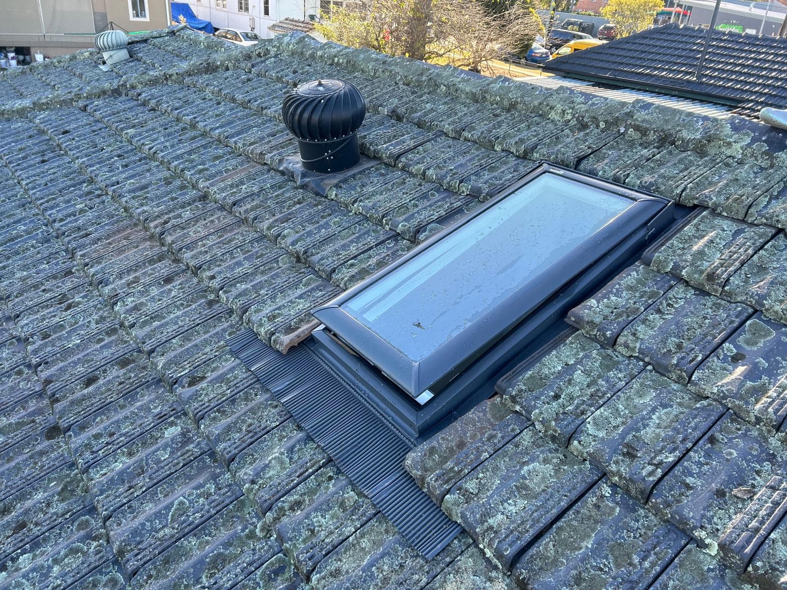 Tile roof skylight flashing and surrounding roof detail