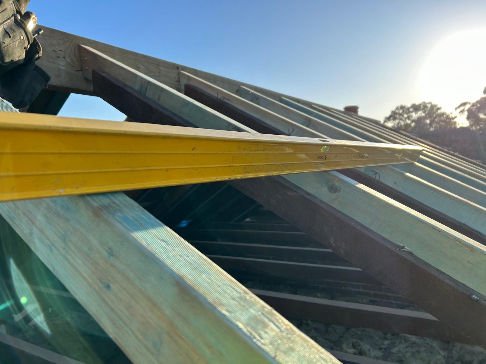 Urban roof framing and access beside commercial buildings