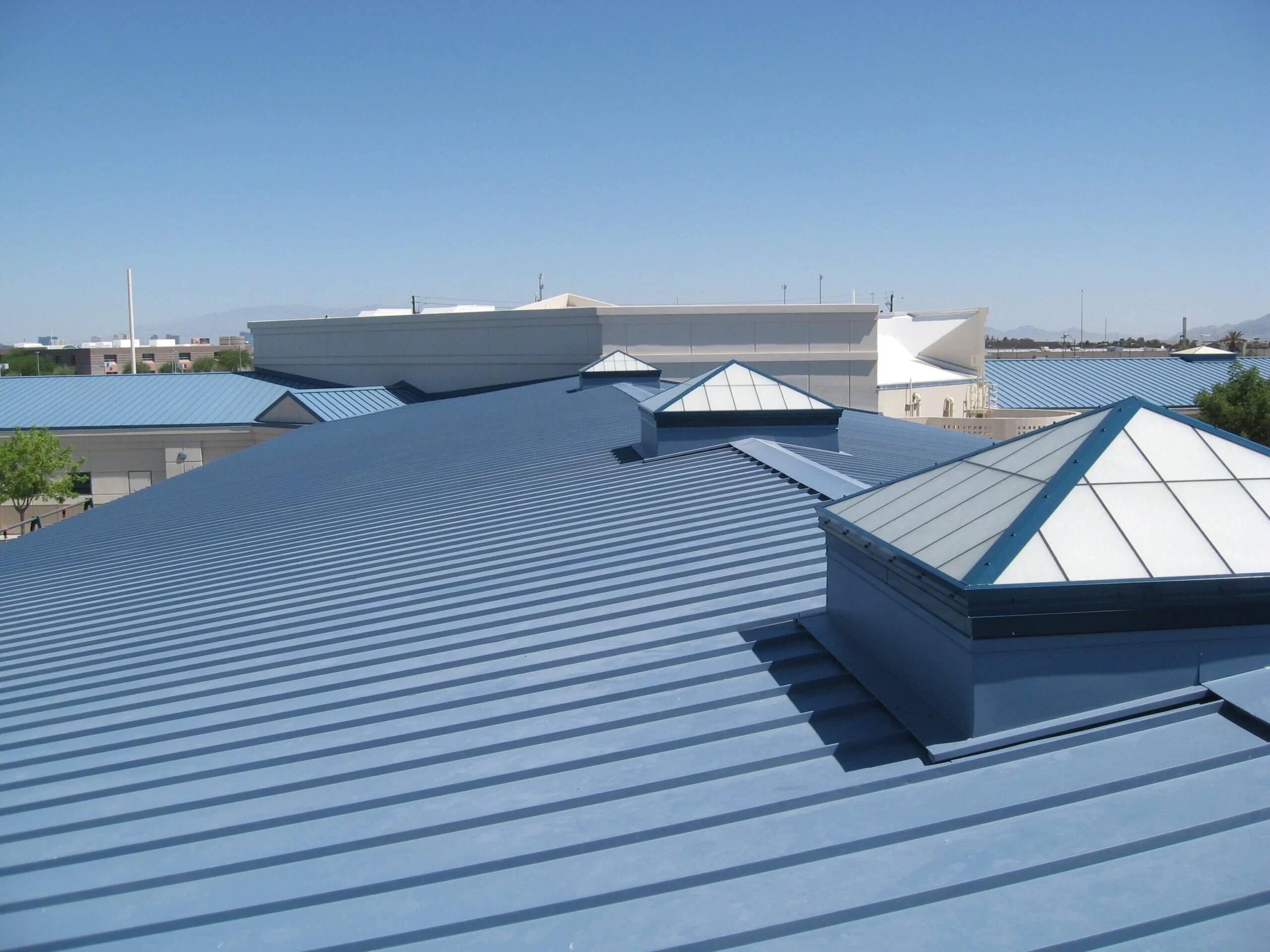 Metal roofing across a multi-unit building
