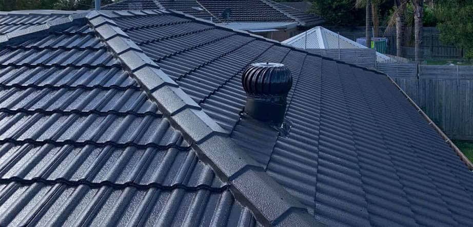 Pitched tile roof with ridge capping and roof valleys